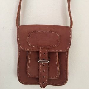 Genuine leather purse.  to use in waist, crossed